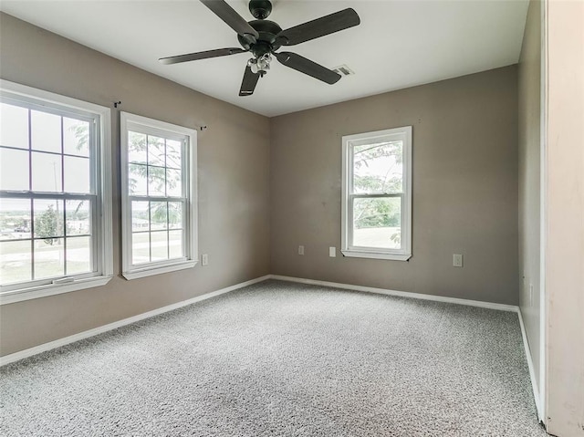 922 W 7th St, Stroud, OK 74079 - carpeted spare room with healthy amount of natural light, baseboards, and ceiling fan