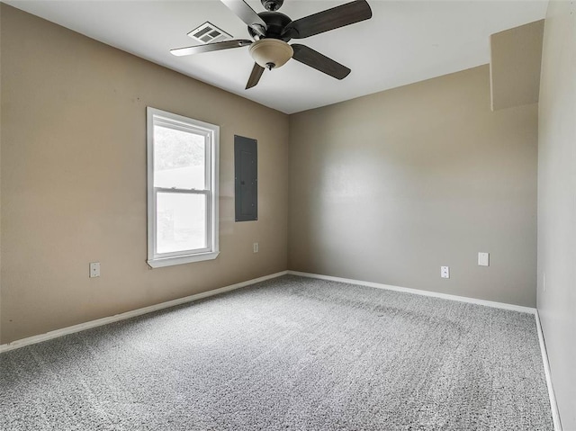 922 W 7th St, Stroud, OK 74079 - unfurnished room with electric panel, carpet, a ceiling fan, and baseboards