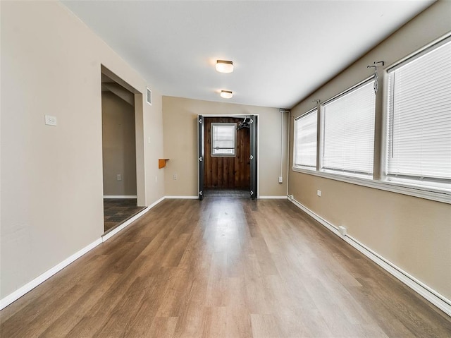 922 W 7th St, Stroud, OK 74079 - entrance foyer featuring wood finished floors and baseboards