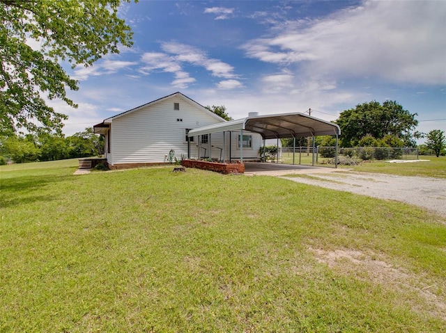 922 W 7th St, Stroud, OK 74079 - view of home's exterior with dirt driveway and a carport