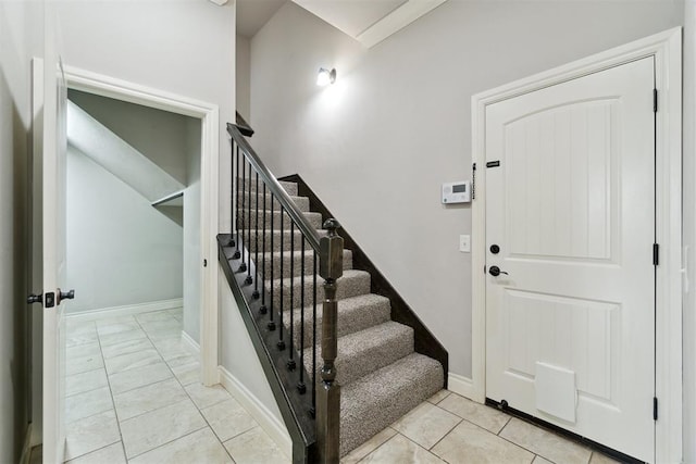 staircase with baseboards