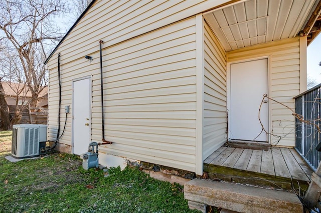 view of exterior entry featuring central AC