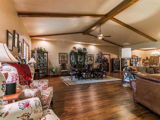 8501 S Council Rd, Oklahoma City, OK 73169 - living area featuring wood finished floors, ceiling fan, a chandelier, a textured wall, and arched walkways