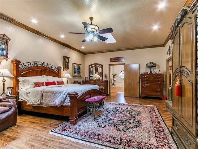 8501 S Council Rd, Oklahoma City, OK 73169 - bedroom featuring crown molding, light wood finished floors, a textured ceiling, ceiling fan, and ensuite bathroom