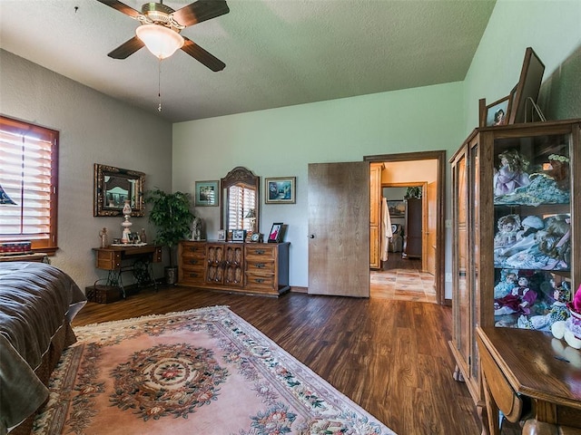 8501 S Council Rd, Oklahoma City, OK 73169 - bedroom with wood finished floors and a textured ceiling