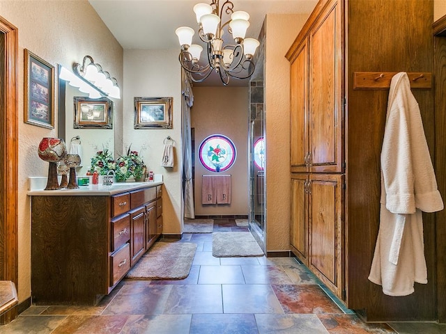 8501 S Council Rd, Oklahoma City, OK 73169 - entryway featuring a textured wall, a chandelier, and stone finish floors