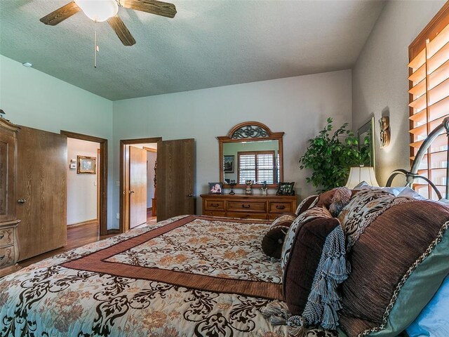 8501 S Council Rd, Oklahoma City, OK 73169 - bedroom with wood finished floors and a ceiling fan