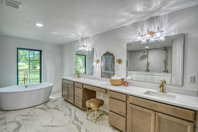 40202 Benson Park Rd, Shawnee, OK 74801 - bathroom with marble finish floors, double vanity, a freestanding bath, a shower, and recessed lighting