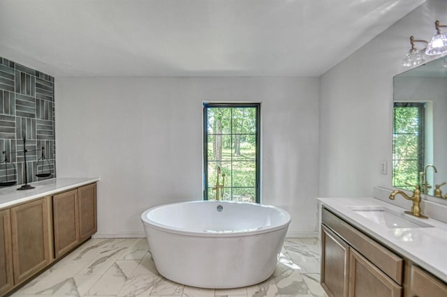 40202 Benson Park Rd, Shawnee, OK 74801 - full bath featuring vanity, marble look tiles, and a freestanding bath