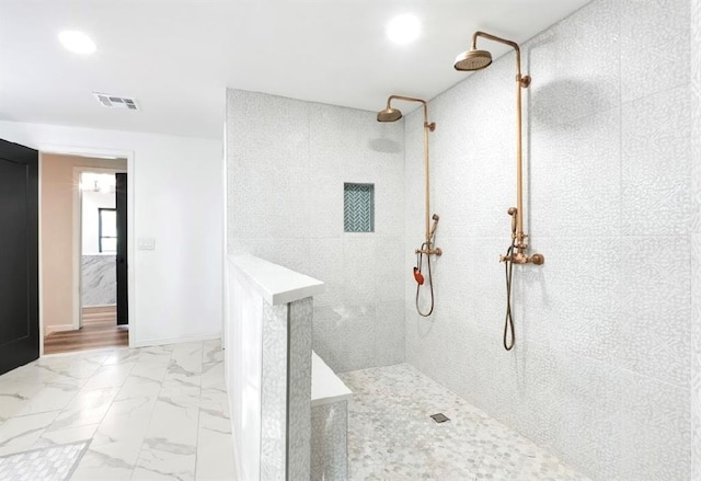 40202 Benson Park Rd, Shawnee, OK 74801 - full bathroom featuring a walk in shower, marble look tiles, and recessed lighting