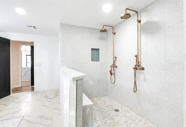 40202 Benson Park Rd, Shawnee, OK 74801 - full bathroom featuring a walk in shower, marble look tiles, and recessed lighting