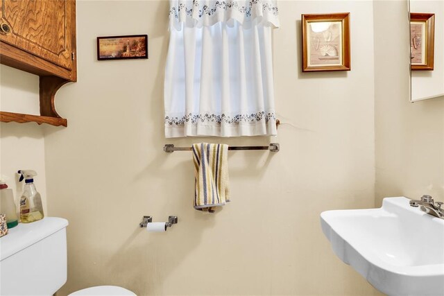 7108 S Kentucky St, Oklahoma City, OK 73159 - bathroom with a sink and toilet