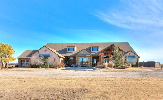 5400 N Piedmont Rd Unit A, Piedmont, OK 73078 - view of front of property with stone siding