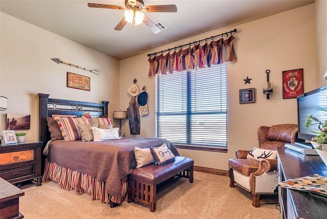 5400 N Piedmont Rd Unit A, Piedmont, OK 73078 - bedroom featuring light carpet, ceiling fan, and baseboards