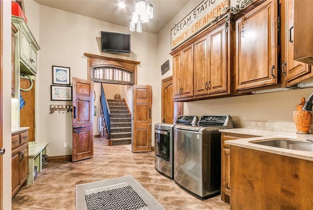 5400 N Piedmont Rd Unit A, Piedmont, OK 73078 - washroom featuring cabinet space and washing machine and clothes dryer