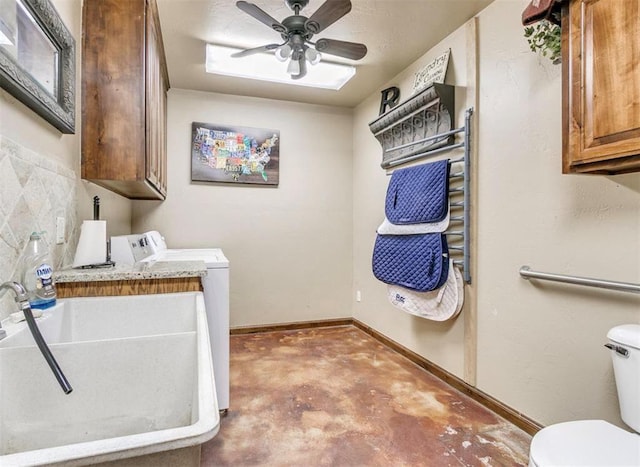 5400 N Piedmont Rd Unit A, Piedmont, OK 73078 - laundry room with washer and dryer, ceiling fan, and baseboards