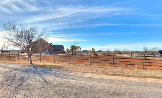 5400 N Piedmont Rd Unit A, Piedmont, OK 73078 - view of yard with a view of rural / pastoral area and an enclosed horse arena