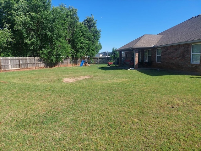 531 W Shadow Ridge Way, Mustang, OK 73064 - view of yard featuring a playground