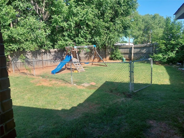 531 W Shadow Ridge Way, Mustang, OK 73064 - view of yard with a playground