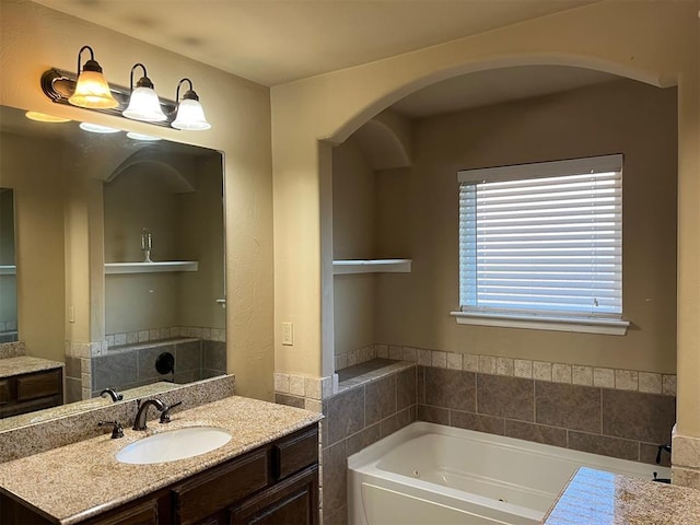 531 W Shadow Ridge Way, Mustang, OK 73064 - bathroom with a tub with jets and vanity