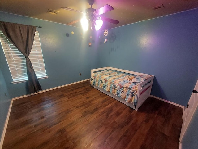 531 W Shadow Ridge Way, Mustang, OK 73064 - bedroom featuring wood finished floors, baseboards, and a ceiling fan