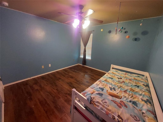 531 W Shadow Ridge Way, Mustang, OK 73064 - bedroom featuring wood finished floors, baseboards, and a ceiling fan