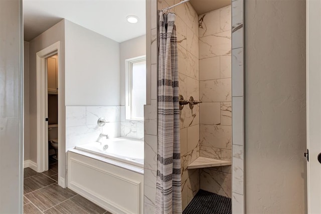 3024 Drake Crest Dr, Edmond, OK 73034 - full bathroom featuring a shower stall, a garden tub, and toilet