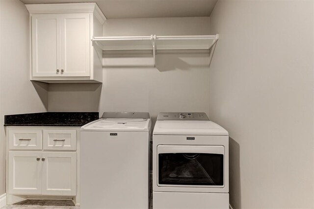 3024 Drake Crest Dr, Edmond, OK 73034 - laundry area featuring washer and clothes dryer and cabinet space