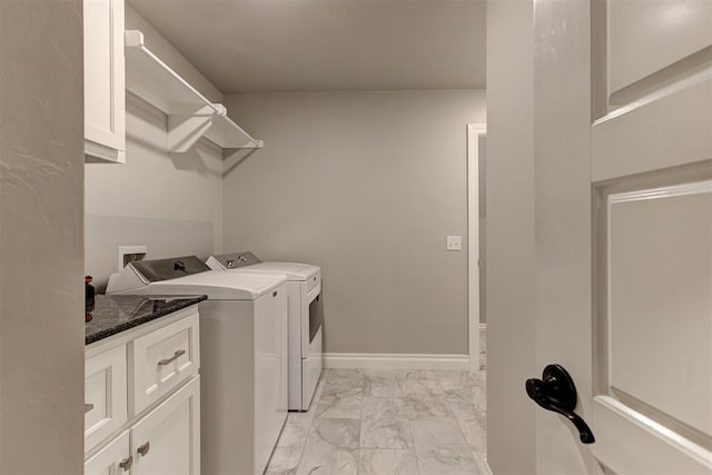 3024 Drake Crest Dr, Edmond, OK 73034 - laundry room with light marble finish flooring, washer and dryer, and cabinet space