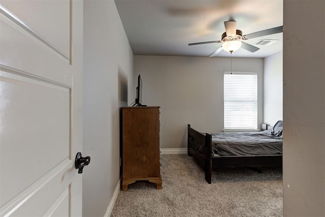 3024 Drake Crest Dr, Edmond, OK 73034 - bedroom with light carpet, baseboards, and a ceiling fan