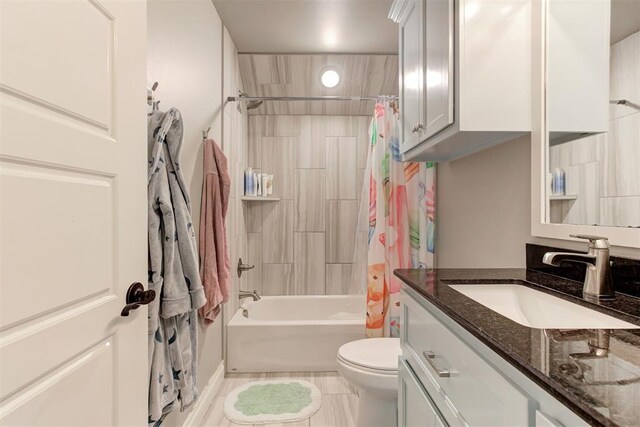 3024 Drake Crest Dr, Edmond, OK 73034 - bathroom featuring toilet, shower / bath combo with shower curtain, and vanity