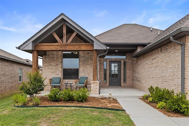 4705 Bermuda Dr, Mustang, OK 73064 - doorway to property featuring brick siding and a lawn