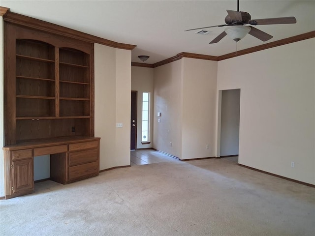824 SE 38th St, Moore, OK 73129 - unfurnished living room featuring ornamental molding, light colored carpet, ceiling fan, a desk, and baseboards