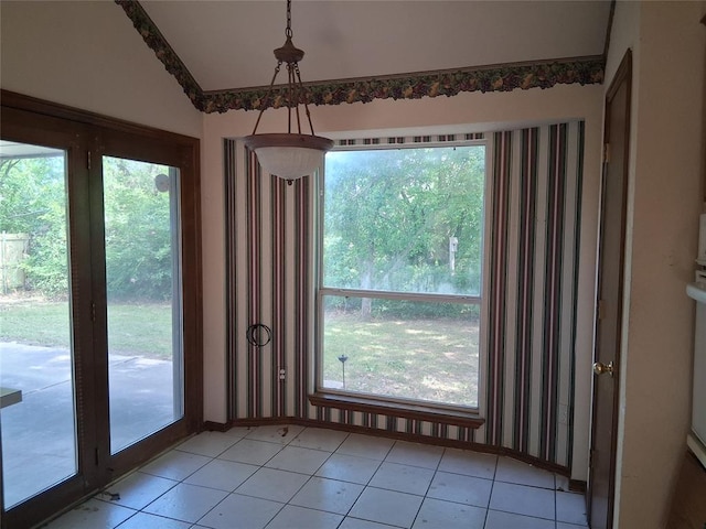 824 SE 38th St, Moore, OK 73129 - unfurnished dining area with lofted ceiling and light tile patterned flooring