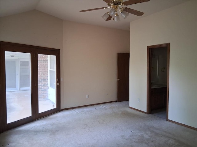 824 SE 38th St, Moore, OK 73129 - unfurnished room featuring light colored carpet, vaulted ceiling, a ceiling fan, and baseboards