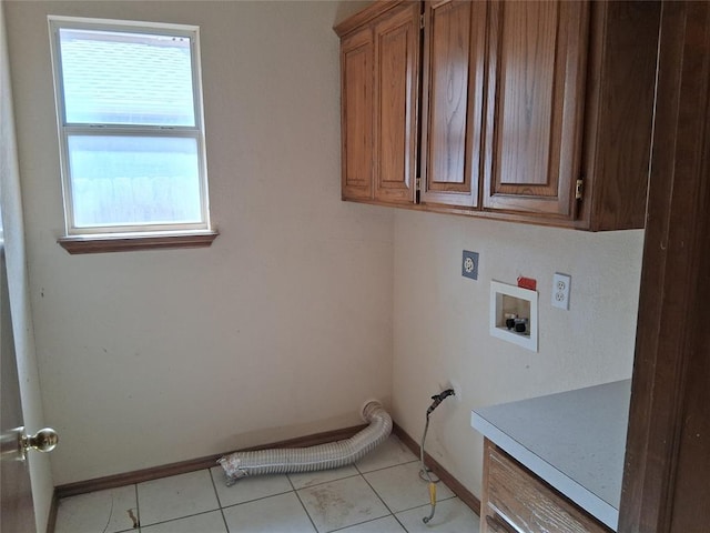 824 SE 38th St, Moore, OK 73129 - laundry area featuring hookup for an electric dryer, cabinet space, hookup for a washing machine, baseboards, and light tile patterned floors