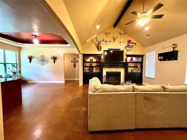 16175 Silver Run Dr, Choctaw, OK 73020 - living room with a fireplace, a ceiling fan, concrete floors, baseboards, and arched walkways