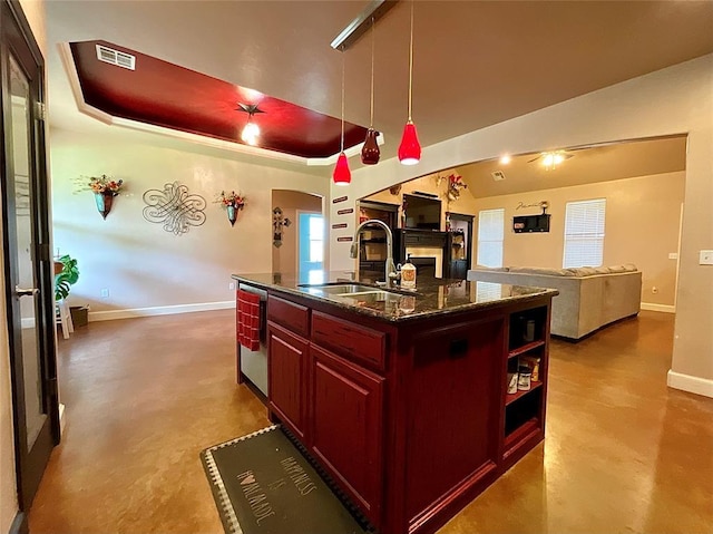 16175 Silver Run Dr, Choctaw, OK 73020 - kitchen featuring a sink, dark brown cabinets, finished concrete floors, and arched walkways