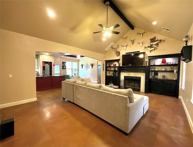 16175 Silver Run Dr, Choctaw, OK 73020 - living area featuring ceiling fan, a fireplace, baseboards, and concrete flooring