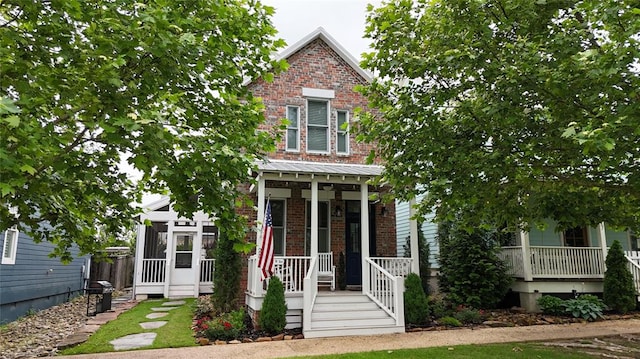 25 Firefly Ln, Eufaula, OK 74432 - view of front of house with brick siding and covered porch