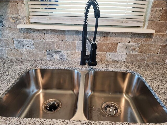 2421 N Prospect Ave, Oklahoma City, OK 73111 - kitchen view of a sink and light stone countertops