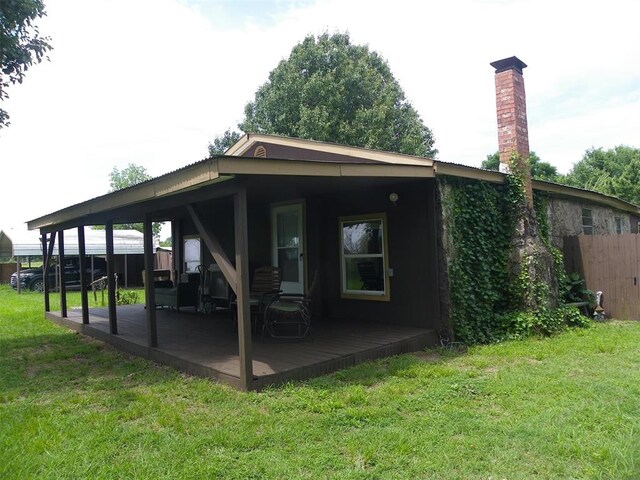 218 N 4150th Rd, Antlers, OK 74523 - rear view of property with a chimney