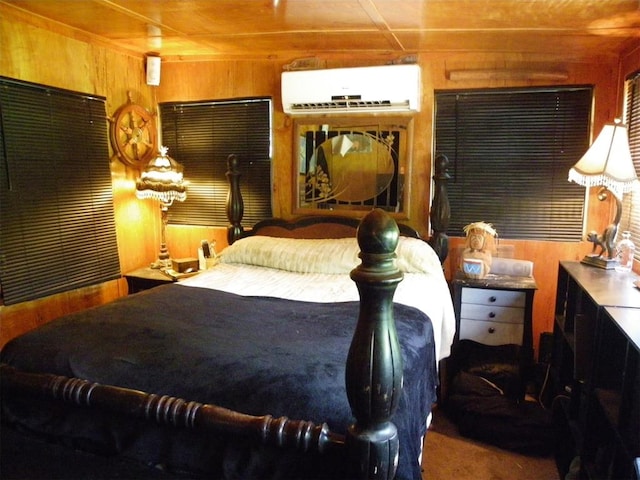 218 N 4150th Rd, Antlers, OK 74523 - bedroom featuring a wall mounted AC and wooden walls