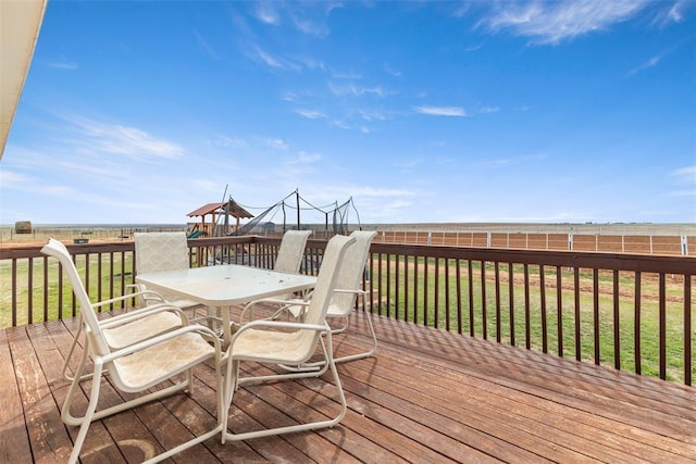 22950 E 1130th Rd, Bessie, OK 73622 - deck with outdoor dining area and a lawn