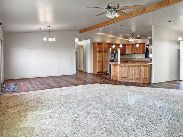 22950 E 1130th Rd, Bessie, OK 73622 - kitchen featuring ceiling fan, open floor plan, brown cabinetry, and dark wood-style flooring