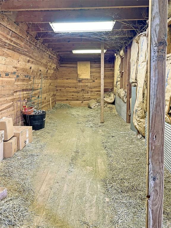 22950 E 1130th Rd, Bessie, OK 73622 - below grade area with wood walls