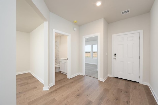 10324 NW 28th St, Yukon, OK 73099 - foyer featuring wood finished floors, baseboards, and recessed lighting