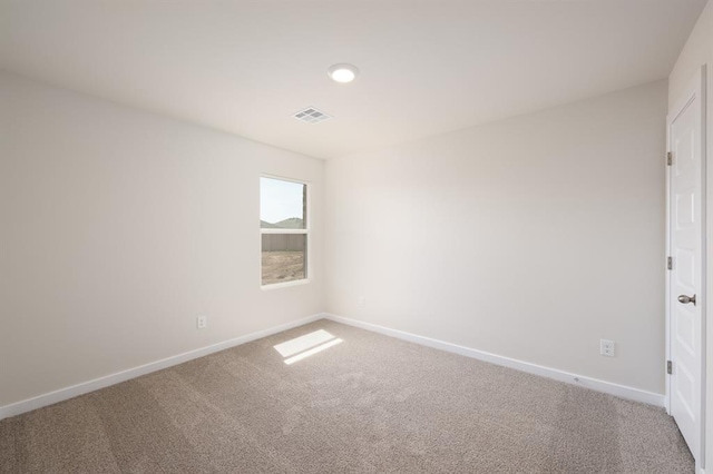 10324 NW 28th St, Yukon, OK 73099 - spare room with carpet and baseboards