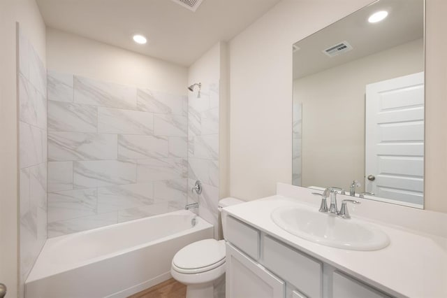 10324 NW 28th St, Yukon, OK 73099 - bathroom with toilet, vanity, washtub / shower combination, and recessed lighting