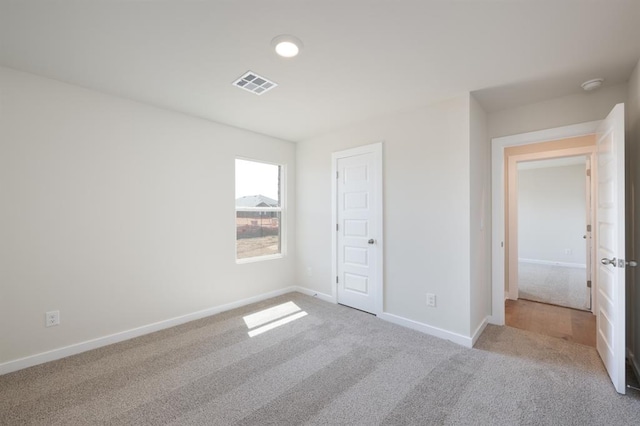 10324 NW 28th St, Yukon, OK 73099 - unfurnished bedroom featuring carpet flooring and baseboards